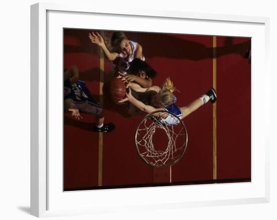 Teenage Girs Playing High School Basketball-null-Framed Photographic Print