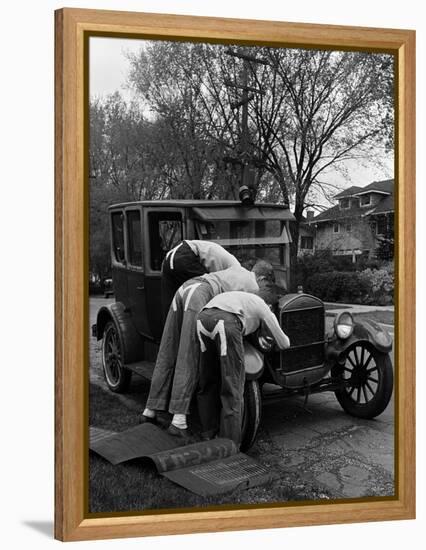 Teenaged Boys Working on a 1927 Ford Model T Automobile-Nina Leen-Framed Premier Image Canvas