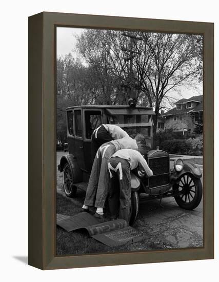 Teenaged Boys Working on a 1927 Ford Model T Automobile-Nina Leen-Framed Premier Image Canvas