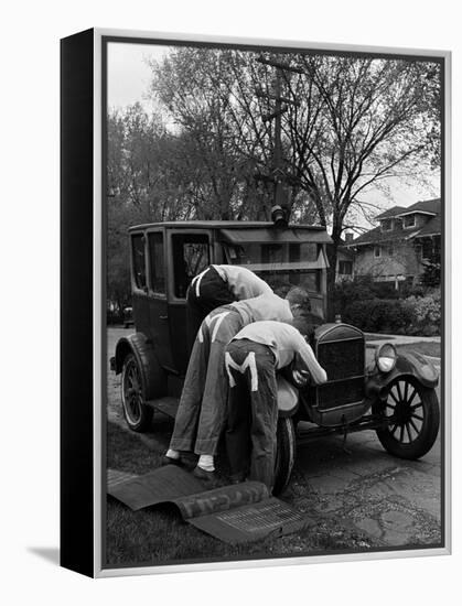 Teenaged Boys Working on a 1927 Ford Model T Automobile-Nina Leen-Framed Premier Image Canvas