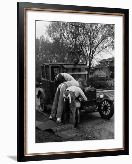 Teenaged Boys Working on a 1927 Ford Model T Automobile-Nina Leen-Framed Premium Photographic Print