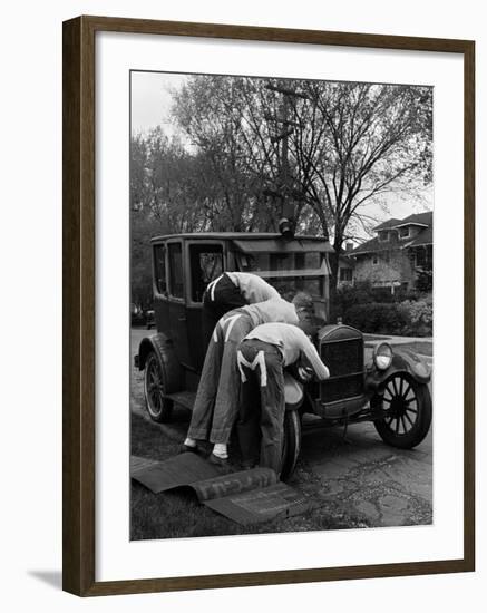 Teenaged Boys Working on a 1927 Ford Model T-Nina Leen-Framed Photographic Print