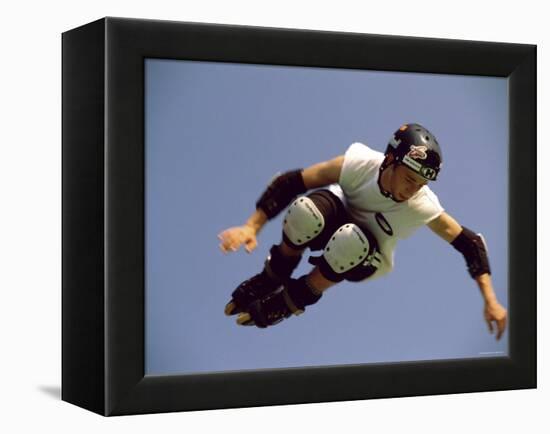 Teenager Inline Skating in Mid-Air-null-Framed Premier Image Canvas