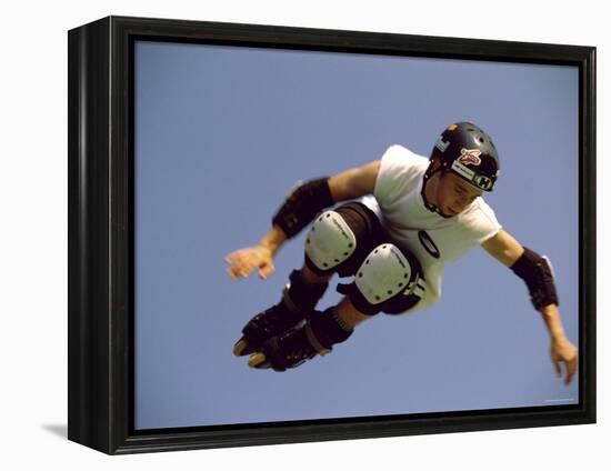 Teenager Inline Skating in Mid-Air-null-Framed Premier Image Canvas