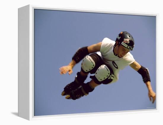 Teenager Inline Skating in Mid-Air-null-Framed Premier Image Canvas