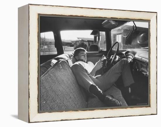 Teenager Robert Riesenmy Jr. Reading in Car at Home-Robert W^ Kelley-Framed Premier Image Canvas