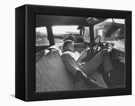 Teenager Robert Riesenmy Jr. Reading in Car at Home-Robert W^ Kelley-Framed Premier Image Canvas