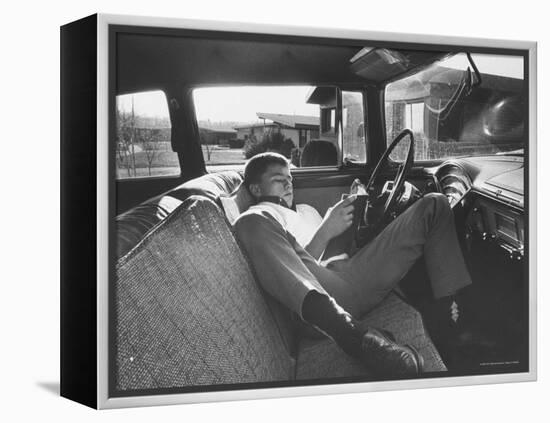 Teenager Robert Riesenmy Jr. Reading in Car at Home-Robert W^ Kelley-Framed Premier Image Canvas