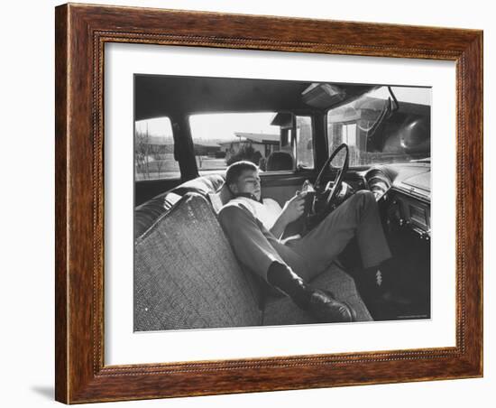 Teenager Robert Riesenmy Jr. Reading in Car at Home-Robert W^ Kelley-Framed Photographic Print