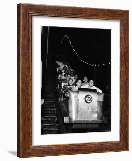 Teenagers in Rollercoaster at Night-Gordon Parks-Framed Photographic Print