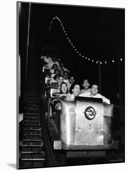 Teenagers in Rollercoaster at Night-Gordon Parks-Mounted Photographic Print