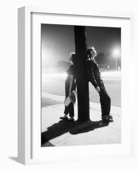 Teenagers Leaning on Utility Pole-Bettmann-Framed Photographic Print