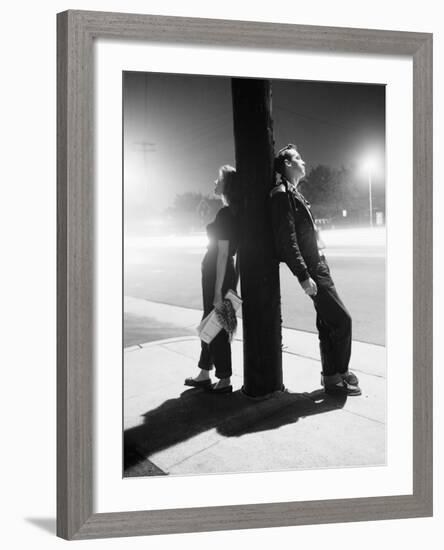 Teenagers Leaning on Utility Pole-Bettmann-Framed Photographic Print