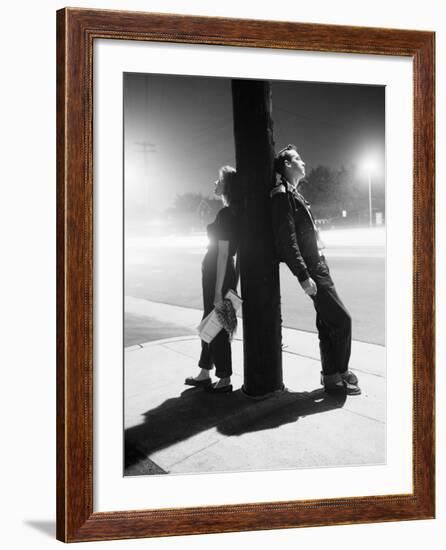 Teenagers Leaning on Utility Pole-Bettmann-Framed Photographic Print