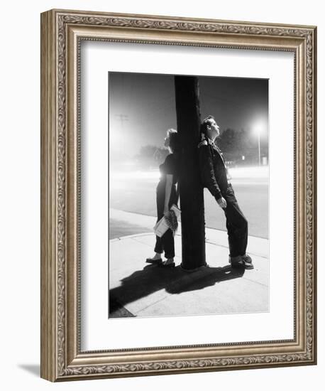 Teenagers Leaning on Utility Pole-Bettmann-Framed Photographic Print