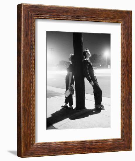 Teenagers Leaning on Utility Pole-Bettmann-Framed Photographic Print