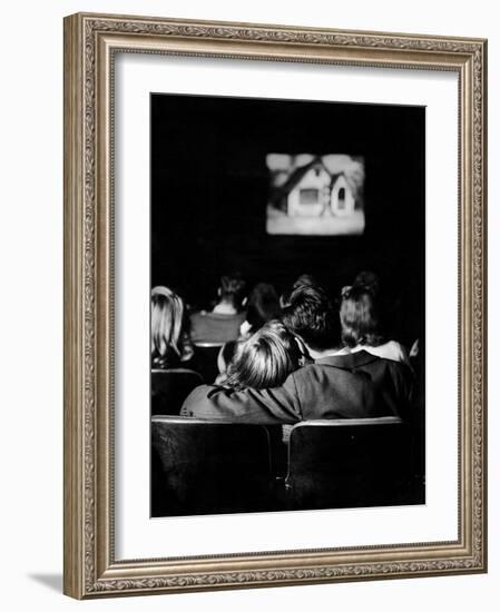 Teenagers "Necking" in a Movie Theater-Nina Leen-Framed Photographic Print