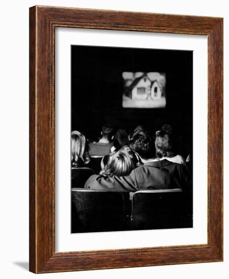 Teenagers "Necking" in a Movie Theater-Nina Leen-Framed Photographic Print