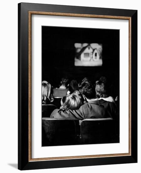 Teenagers "Necking" in a Movie Theater-Nina Leen-Framed Photographic Print