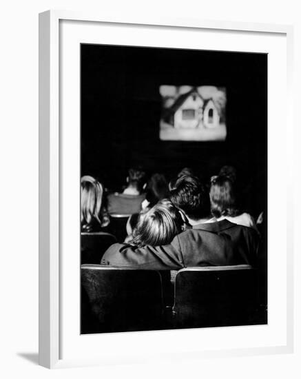 Teenagers "Necking" in a Movie Theater-Nina Leen-Framed Photographic Print