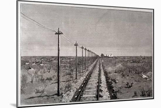 Telegraph Lines Running Alongside a Railway at a Remote Station in the Great Plains of America-null-Mounted Art Print