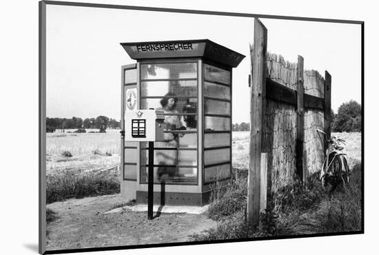 Telephone booth standing on the Western side of the frontier was frequently used by East-Berliners-Erich Lessing-Mounted Photographic Print
