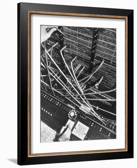 Telephone Operator's Hand Writing on Notepad in New York Telephone Co. Office-Margaret Bourke-White-Framed Photographic Print