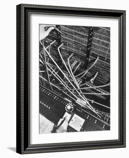 Telephone Operator's Hand Writing on Notepad in New York Telephone Co. Office-Margaret Bourke-White-Framed Photographic Print