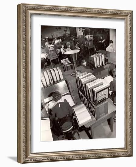 Telephone Operators Consulting Local and Long Distance Books and Directories, New York Telephone Co-Margaret Bourke-White-Framed Photographic Print