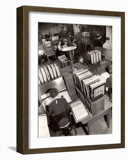 Telephone Operators Consulting Local and Long Distance Books and Directories, New York Telephone Co-Margaret Bourke-White-Framed Photographic Print