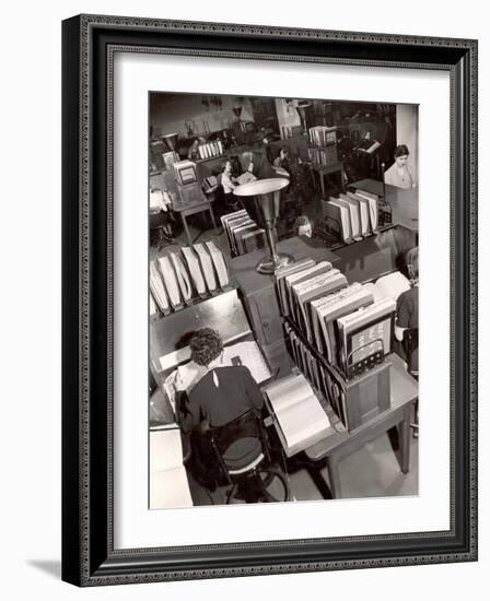 Telephone Operators Consulting Local and Long Distance Books and Directories, New York Telephone Co-Margaret Bourke-White-Framed Photographic Print