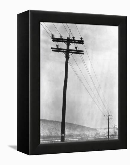 Telephone Poles in Snowy Weather-null-Framed Premier Image Canvas