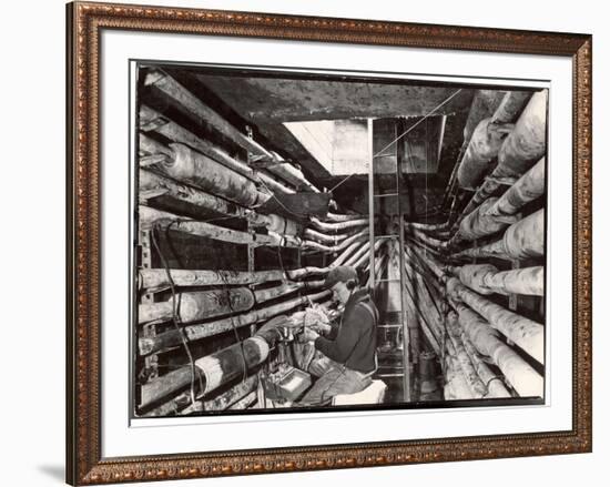 Telephone Repair Man Splicing a Wire in a Manhole for Telephone Cables of the New York Telephone Co-Margaret Bourke-White-Framed Premium Photographic Print