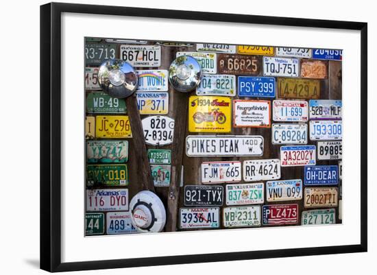 Telluride, Colorado: License Plates Hang On A Fence On A Home In An Alleyway In Downtown Telluride-Ian Shive-Framed Photographic Print