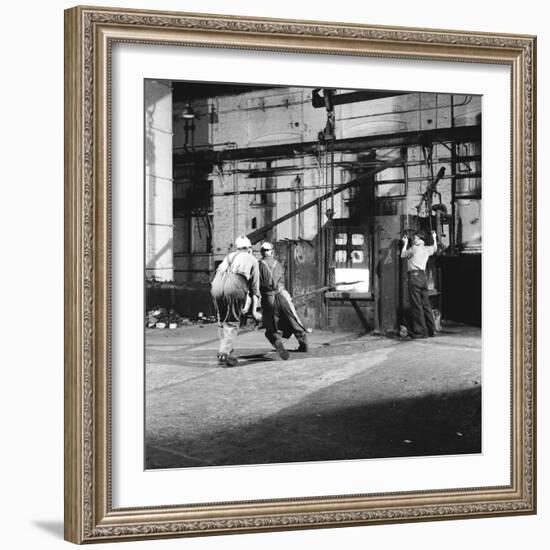 Tempering a Long Metal Bar-Heinz Zinram-Framed Photographic Print