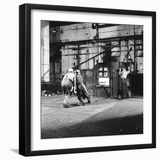 Tempering a Long Metal Bar-Heinz Zinram-Framed Photographic Print