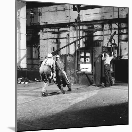 Tempering a Long Metal Bar-Heinz Zinram-Mounted Photographic Print