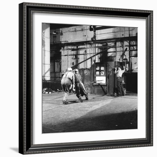 Tempering a Long Metal Bar-Heinz Zinram-Framed Photographic Print