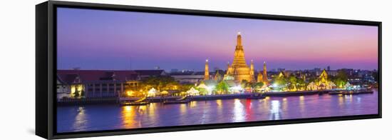 Temple of Dawn (Wat Arun) and Bangkok, Thailand-Jon Arnold-Framed Premier Image Canvas