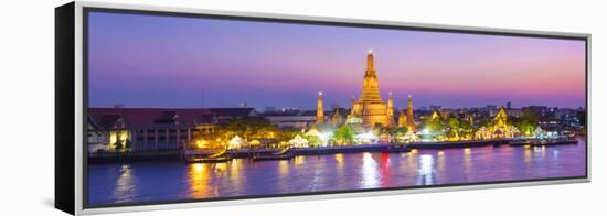 Temple of Dawn (Wat Arun) and Bangkok, Thailand-Jon Arnold-Framed Premier Image Canvas