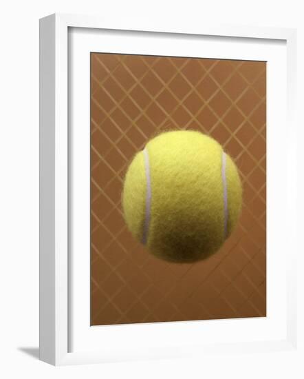 Tennis Ball Against a Racquet-null-Framed Photographic Print