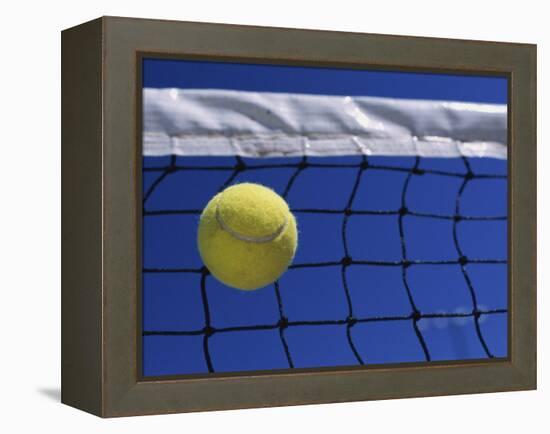 Tennis Ball Hitting Net-null-Framed Premier Image Canvas