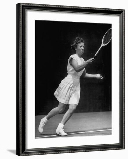 Tennis Player Maureen Connolly, Serving the Ball-Allan Grant-Framed Premium Photographic Print