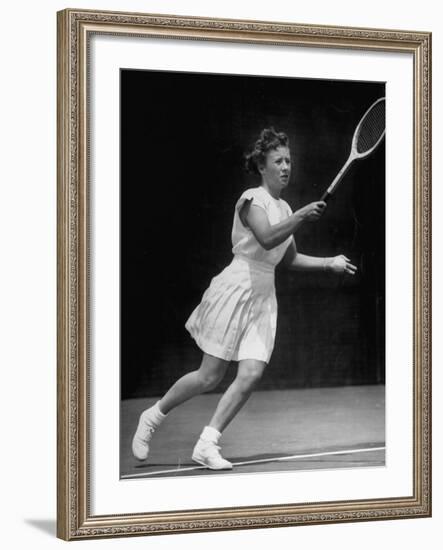Tennis Player Maureen Connolly, Serving the Ball-Allan Grant-Framed Premium Photographic Print