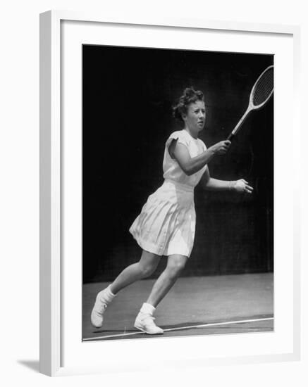 Tennis Player Maureen Connolly, Serving the Ball-Allan Grant-Framed Premium Photographic Print