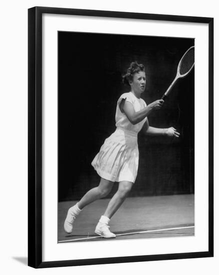 Tennis Player Maureen Connolly, Serving the Ball-Allan Grant-Framed Premium Photographic Print