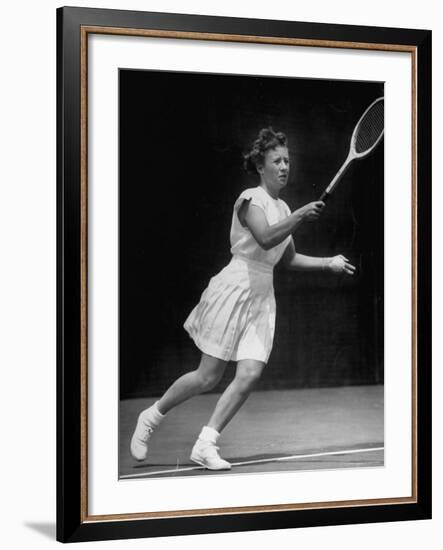 Tennis Player Maureen Connolly, Serving the Ball-Allan Grant-Framed Premium Photographic Print