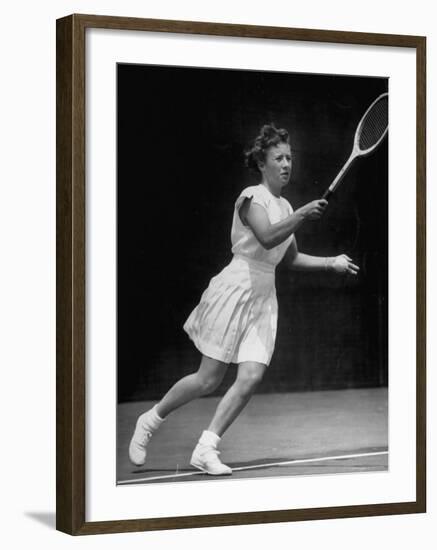 Tennis Player Maureen Connolly, Serving the Ball-Allan Grant-Framed Premium Photographic Print