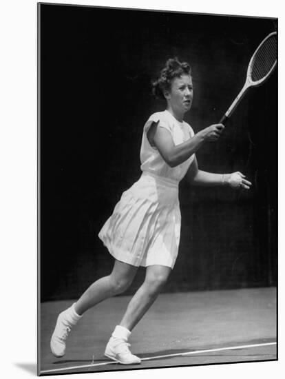 Tennis Player Maureen Connolly, Serving the Ball-Allan Grant-Mounted Premium Photographic Print