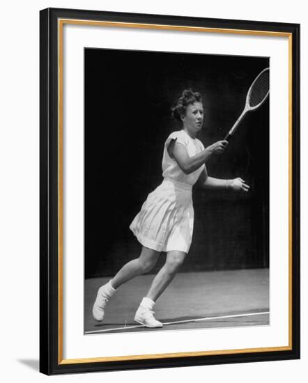 Tennis Player Maureen Connolly, Serving the Ball-Allan Grant-Framed Premium Photographic Print
